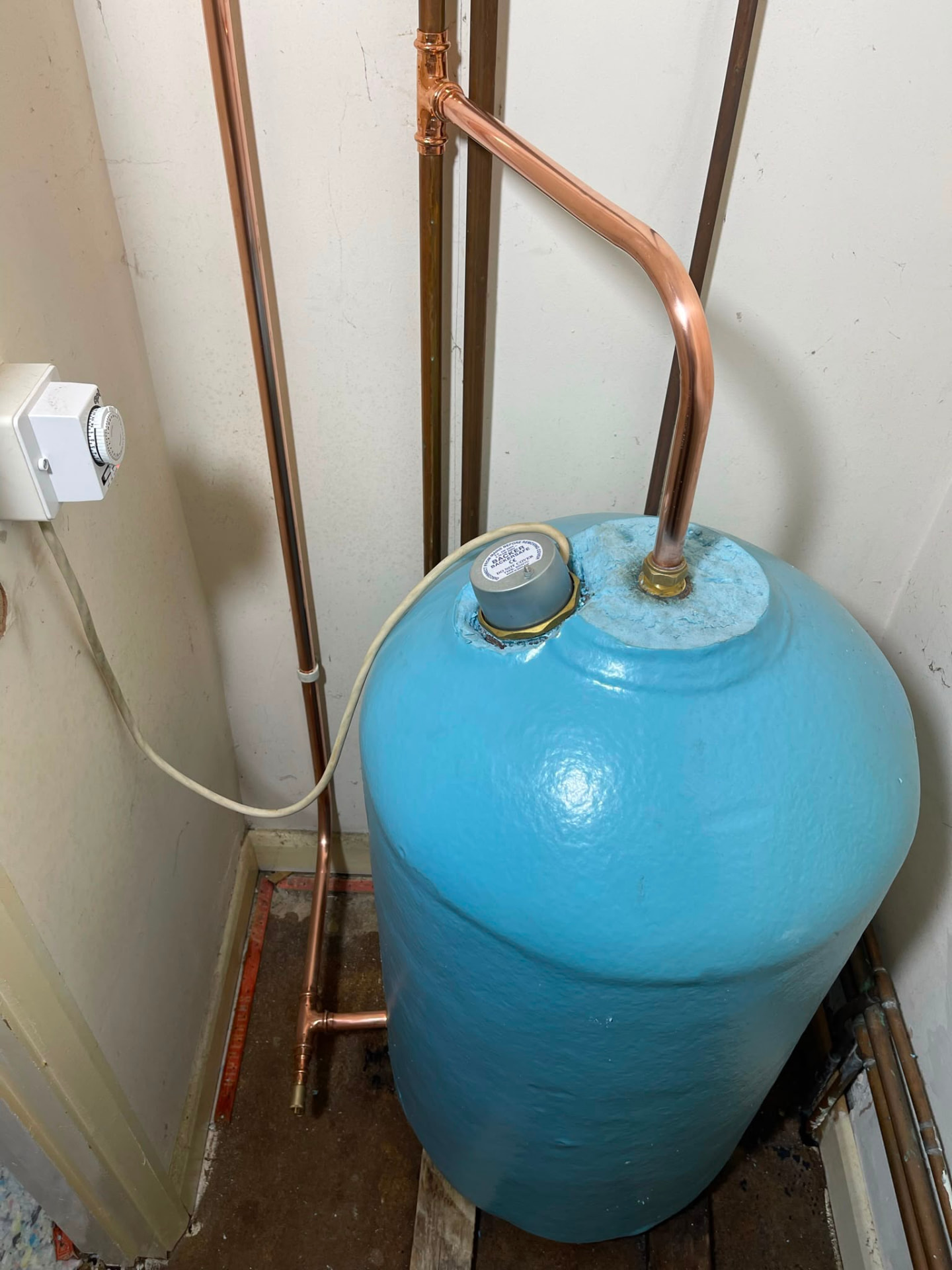 Vented hot water cylinder installation with new copper pipework and blue expansion vessel, fitted by Gas Safe registered engineers in Essex