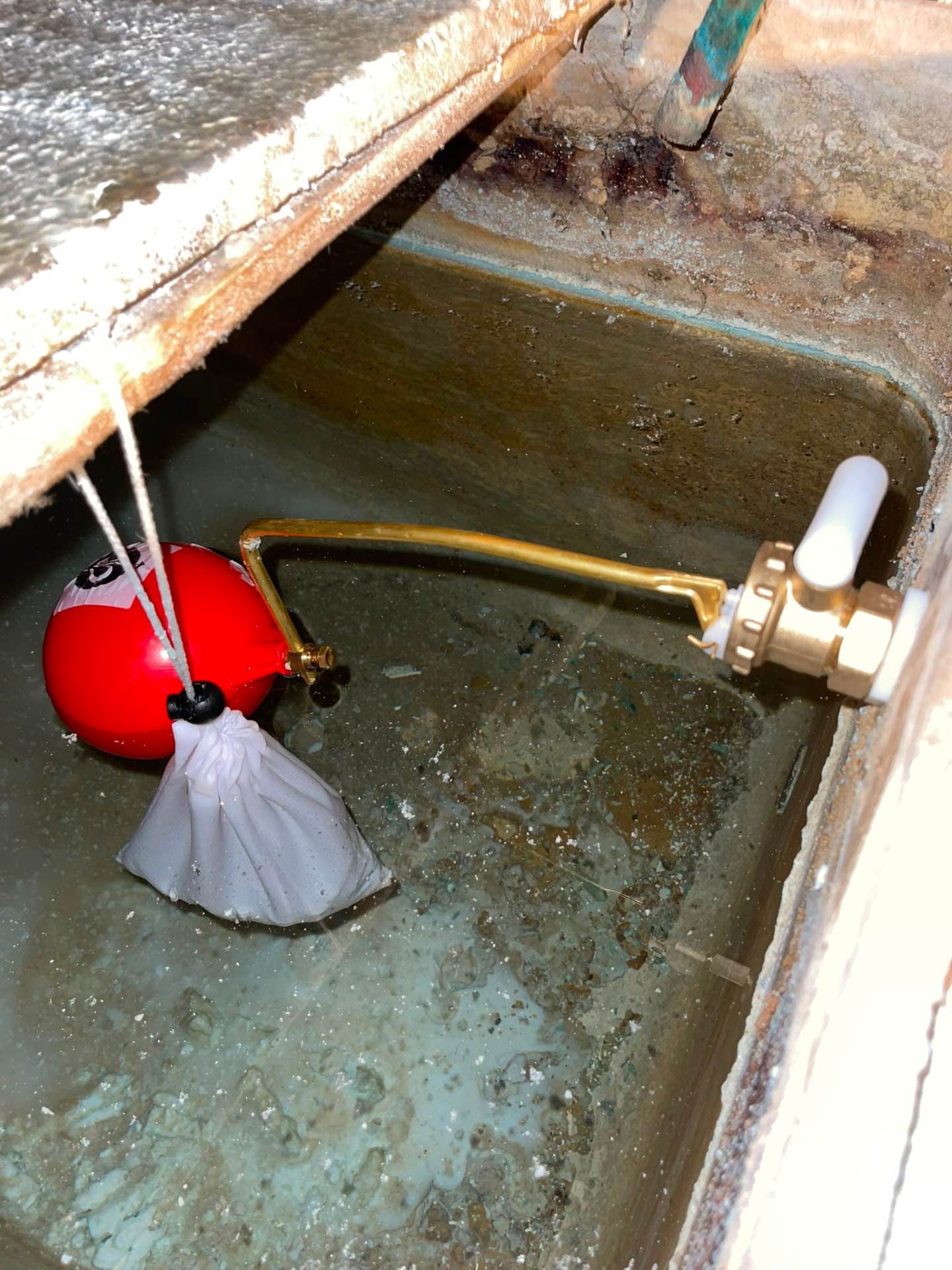 Replacement brass ball valve and float fitted in a cold water storage tank, fitted by Gas Safe registered engineers in Essex